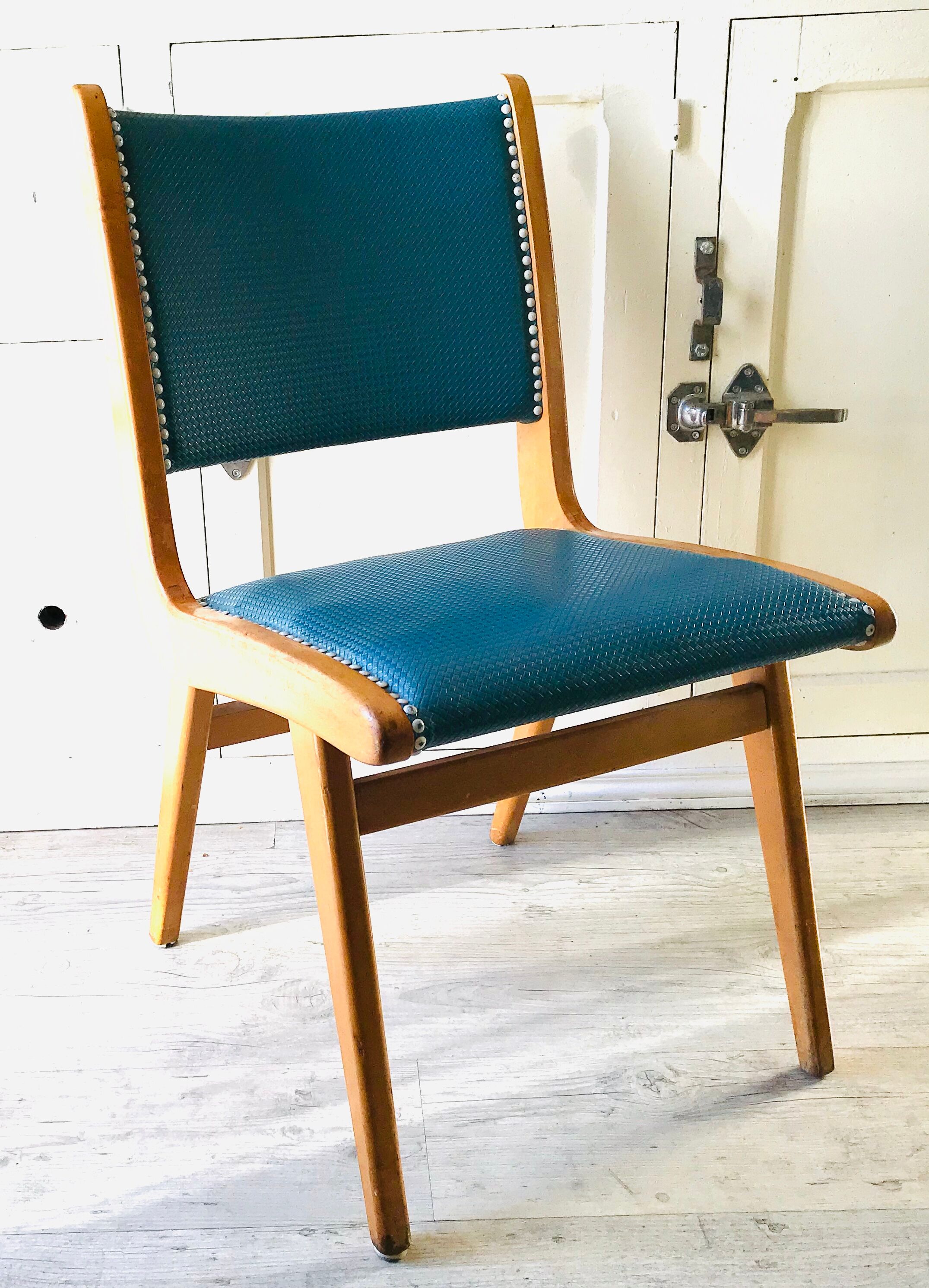 Vintage compass foot chair and studded blue skai