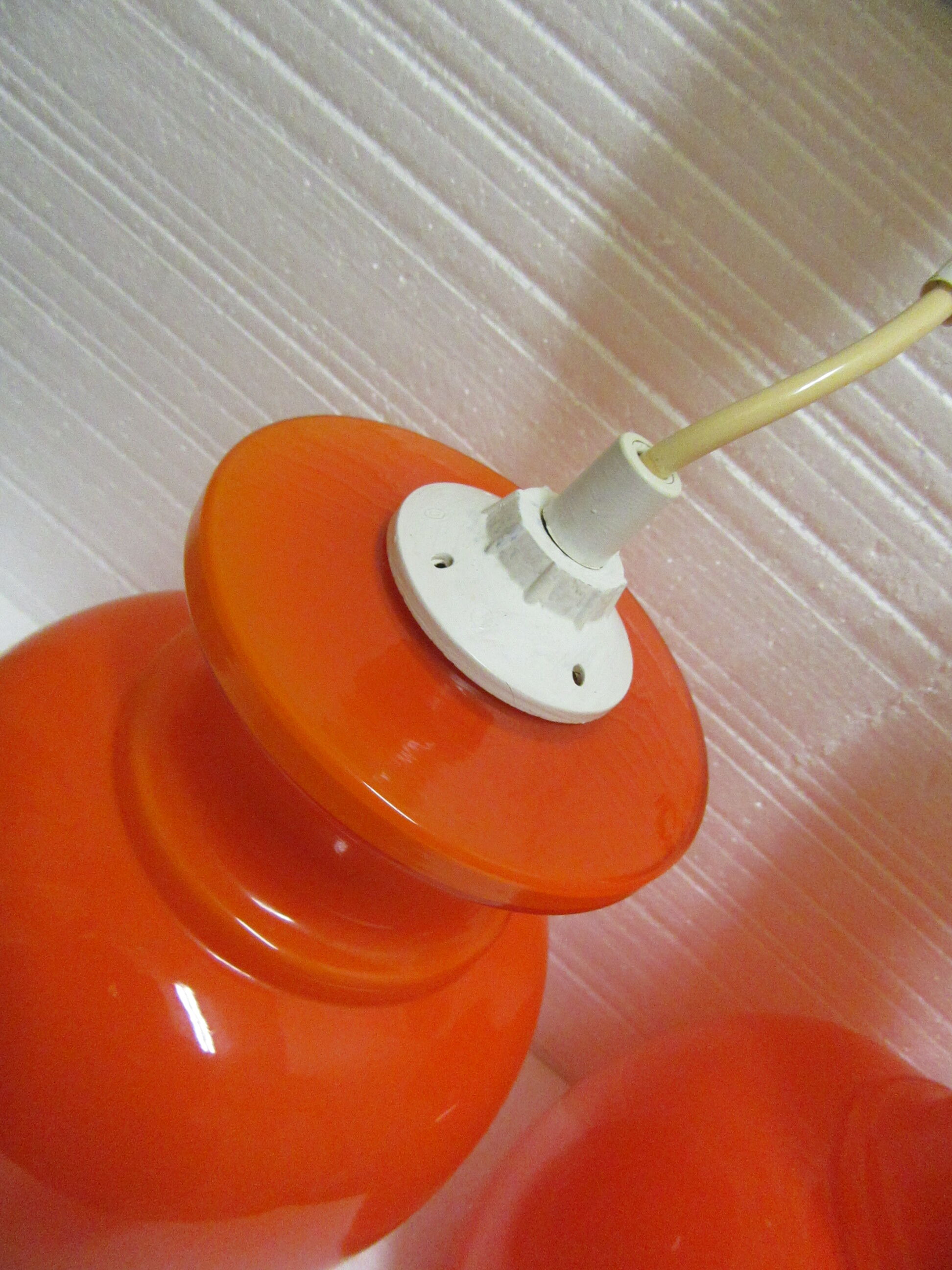 Pair vintage orange hanging lamps