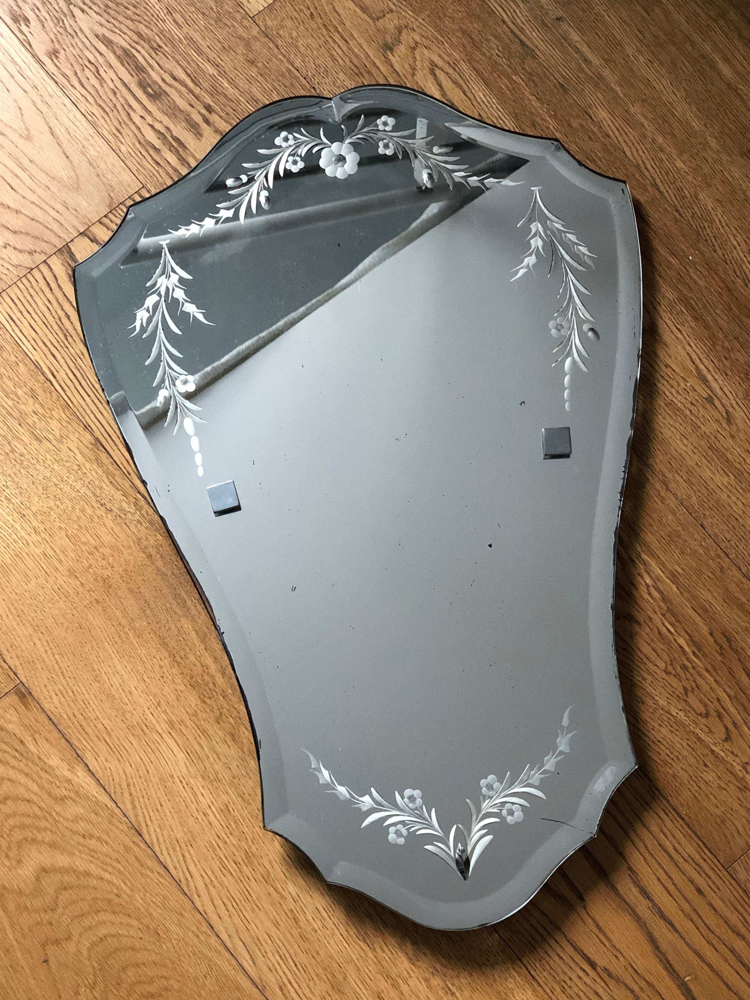Old bevelled and engraved mirror   43x63cm