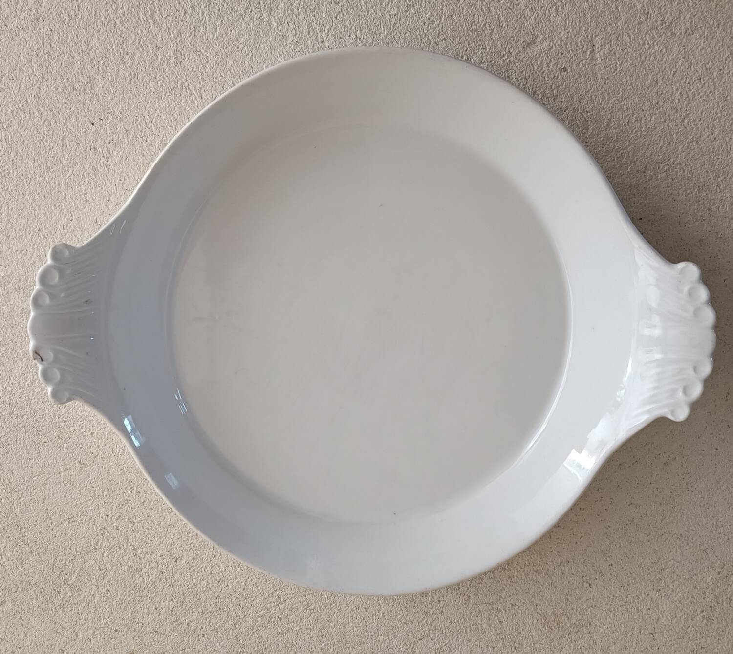 Porcelain fire dish