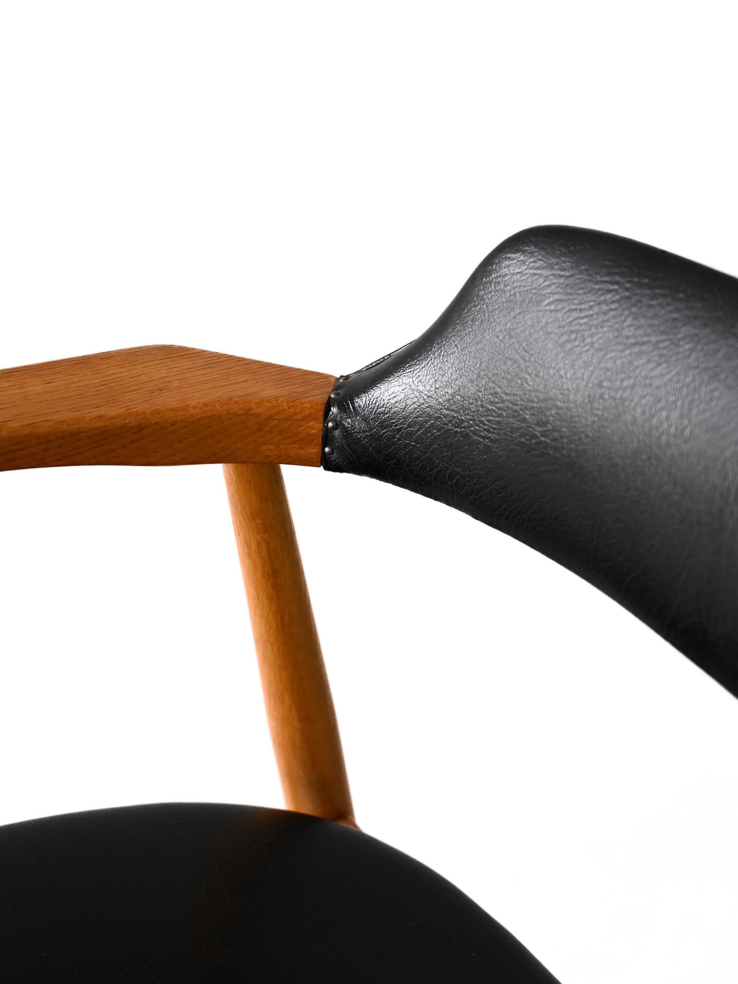 Scandinavian armchair covered in imitation leather