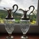 Pair of glass and silver metal ewers