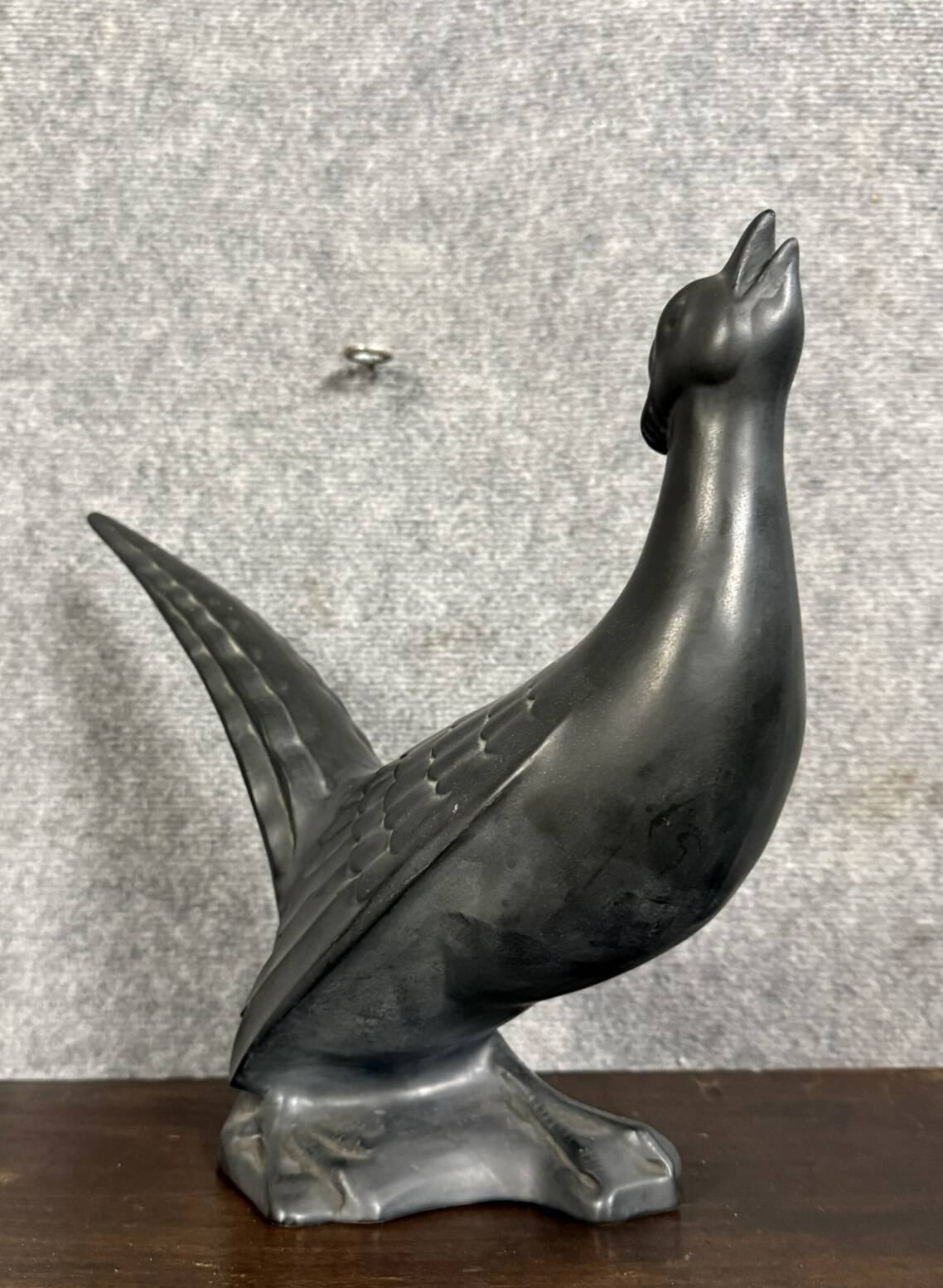 Black lacquered ceramic from the Art Deco period: bird signed Jean