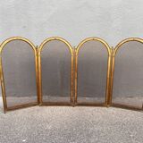 Antique brass fireplace screen from 1920, vintage spark guard.