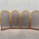 Antique brass fireplace screen from 1920, vintage spark guard.