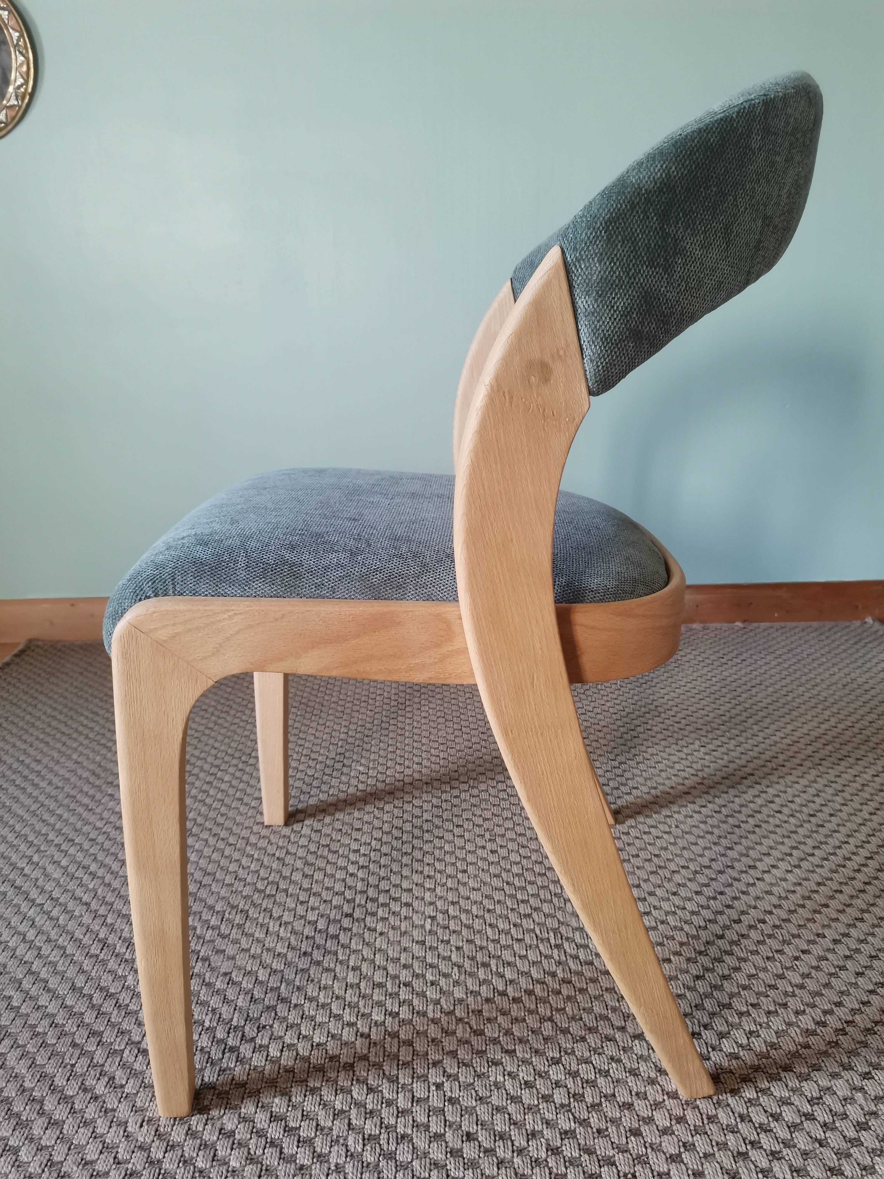 Baumann aqua green gondola chairs