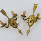Pair of double-light Empire style arrow wall lights in bronze. Early 20th century