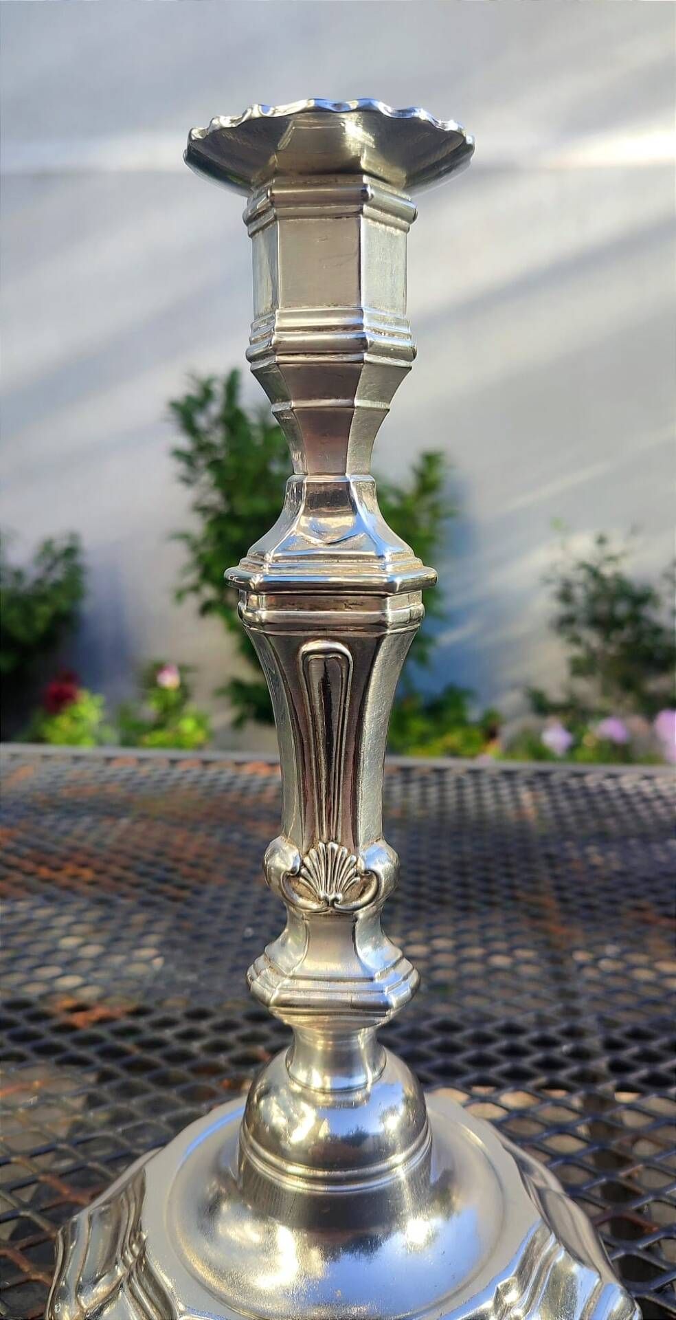 Magnificent pair of silver candlesticks.