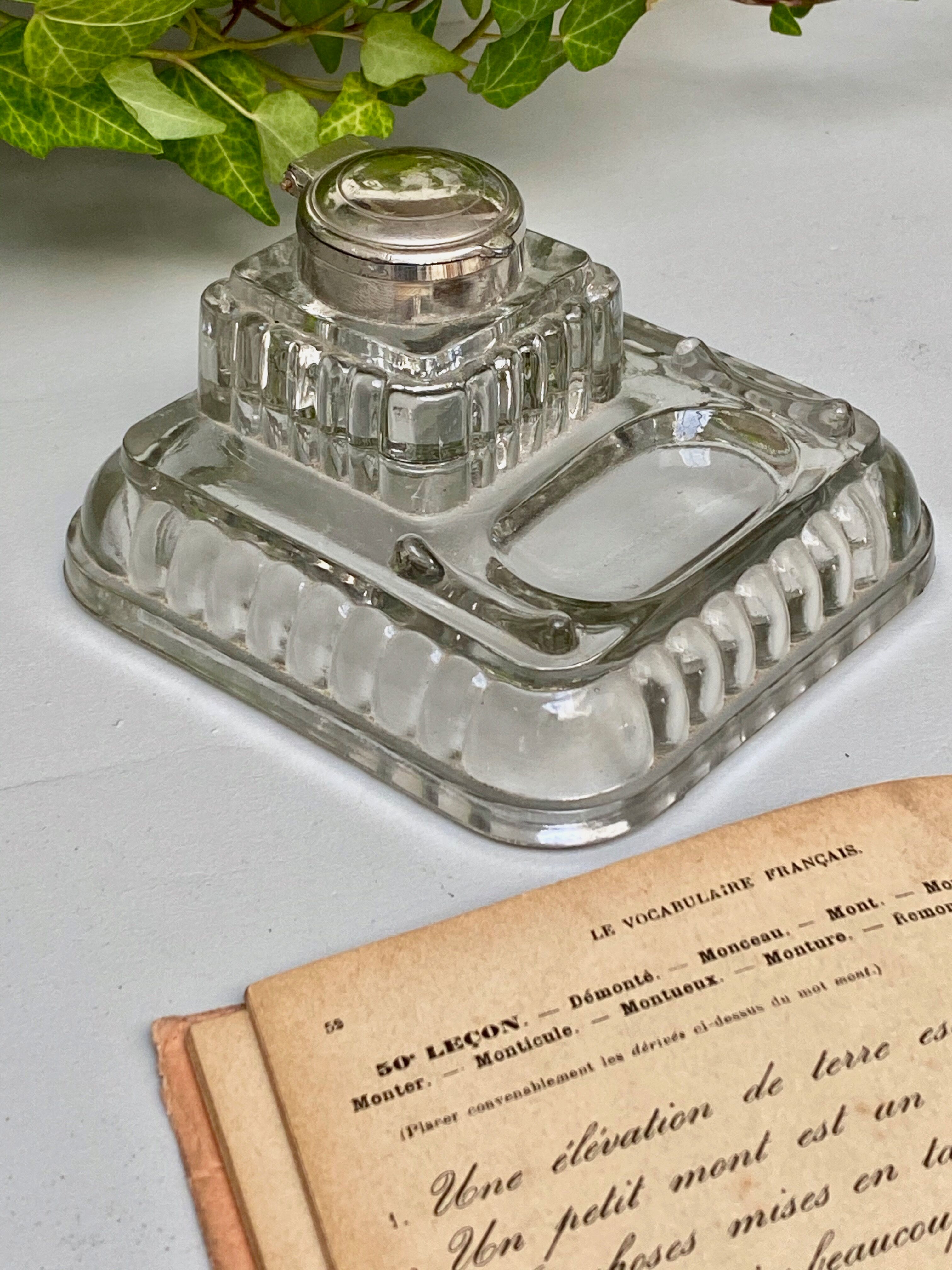 Old glass inkwell