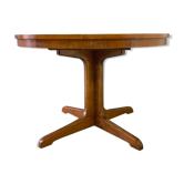 Expandable round table with butterfly extension