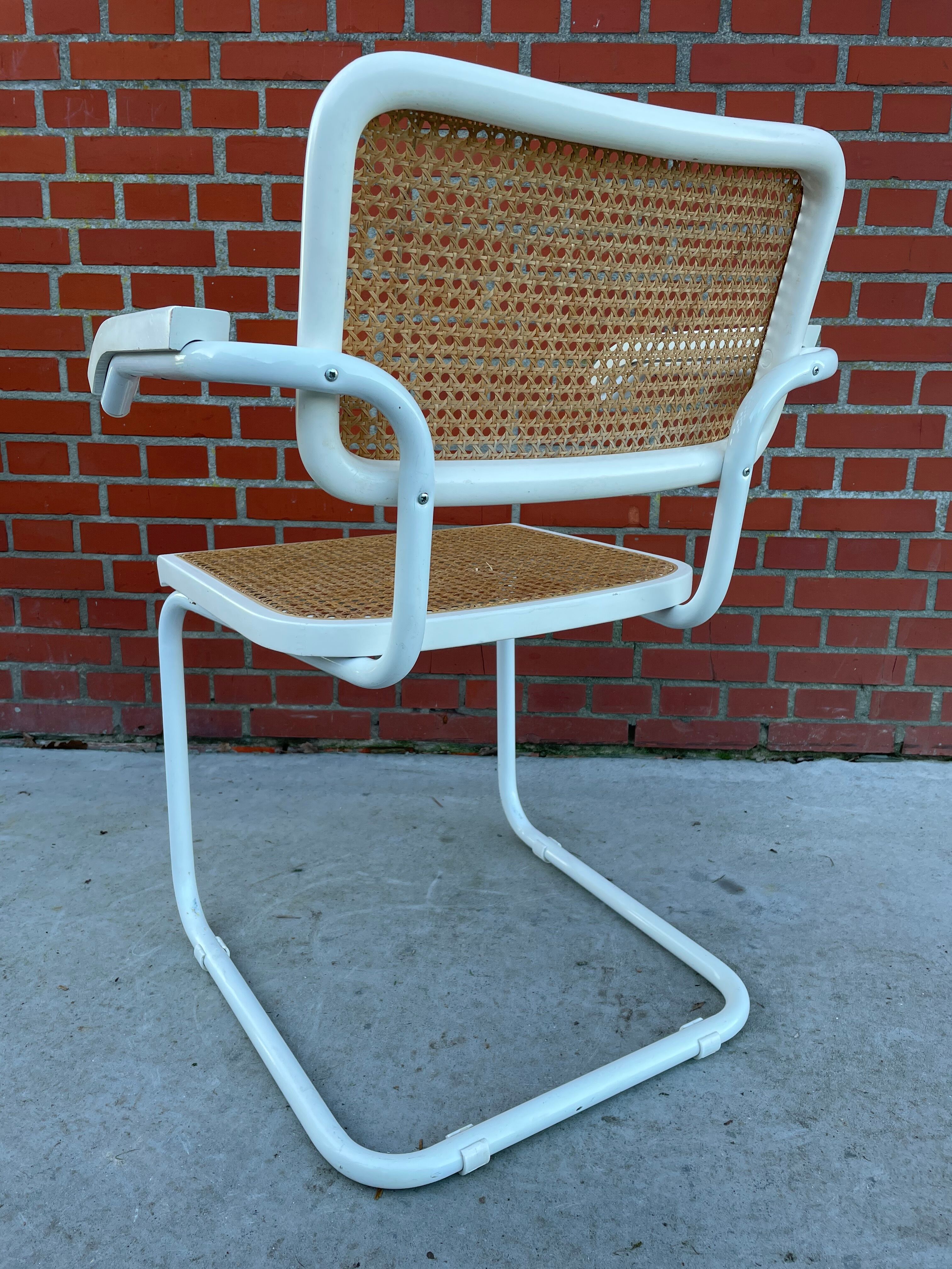 Cesca Chair model with armrest in white
