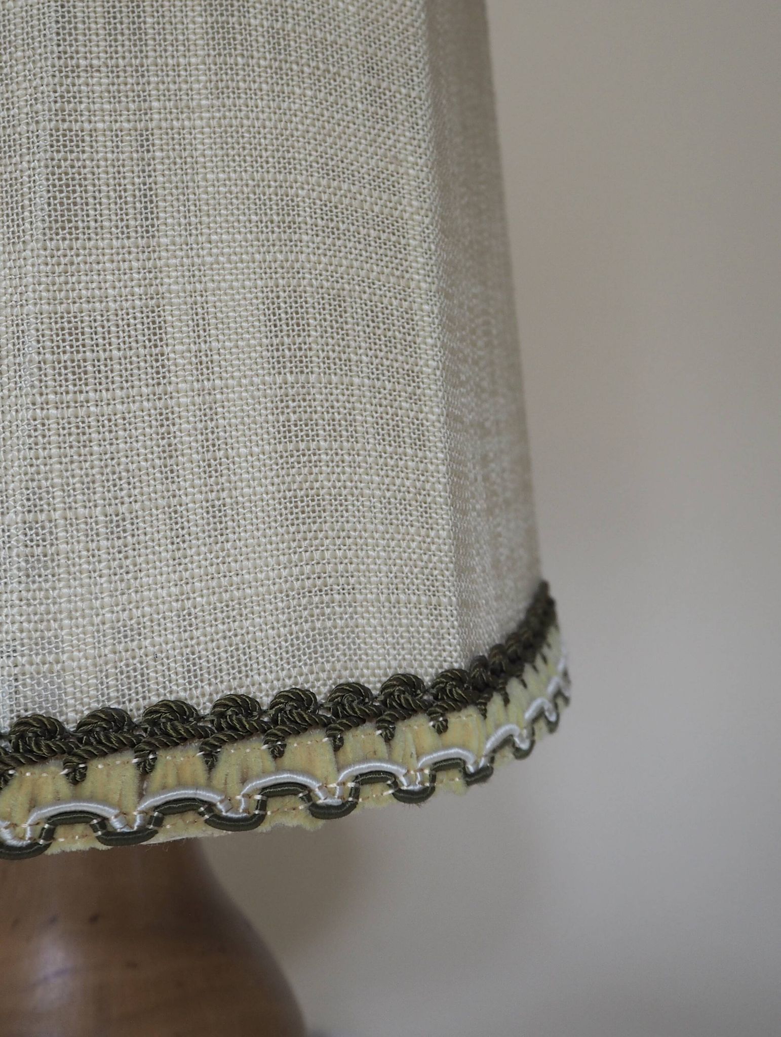 Turned wooden lamp with linen shade