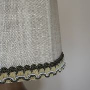 Turned wooden lamp with linen shade