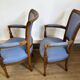 Paire de fauteuils de style Louis XVI en bois sculpté