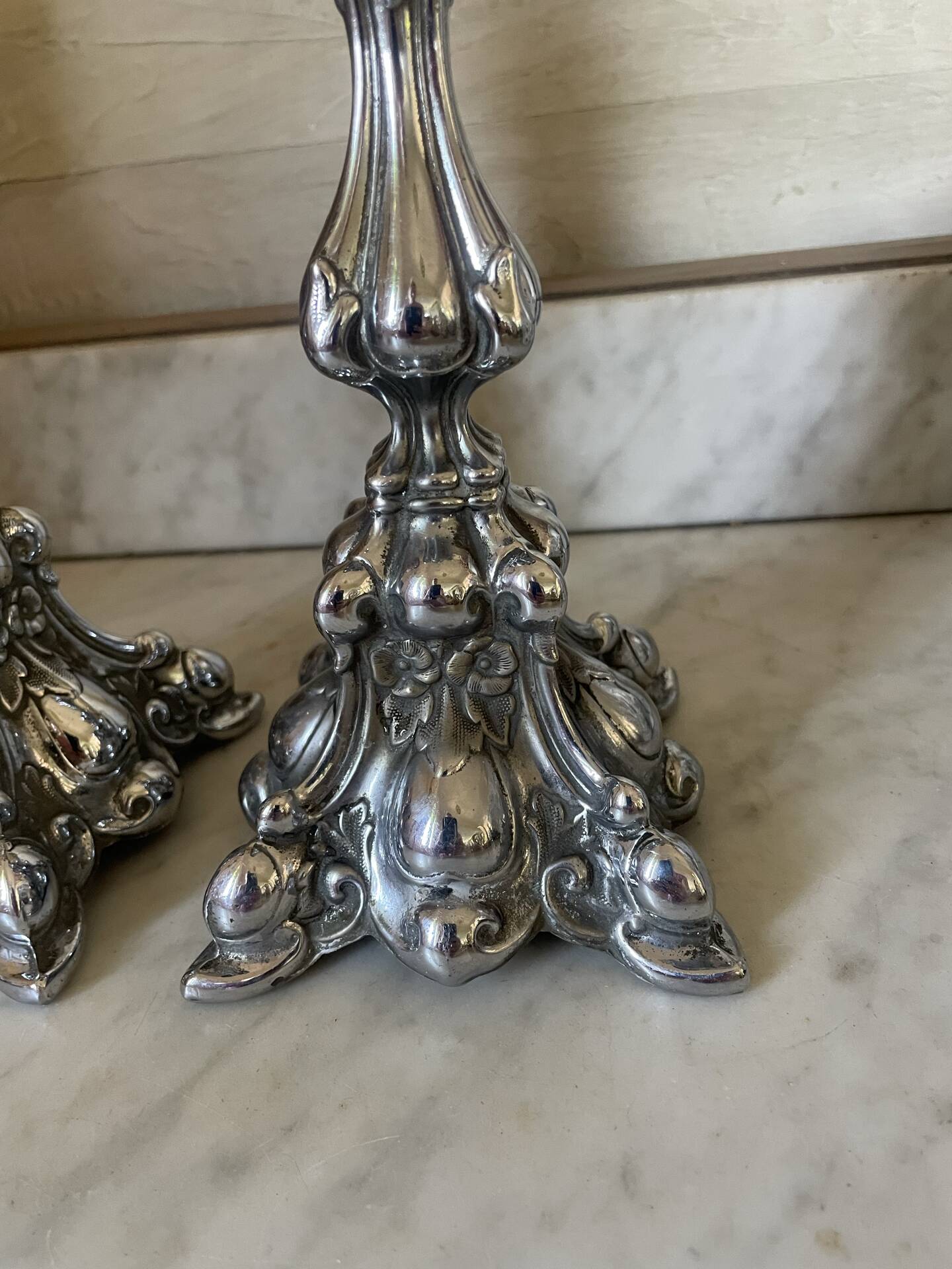 Pair of rococo silver-plated candlesticks