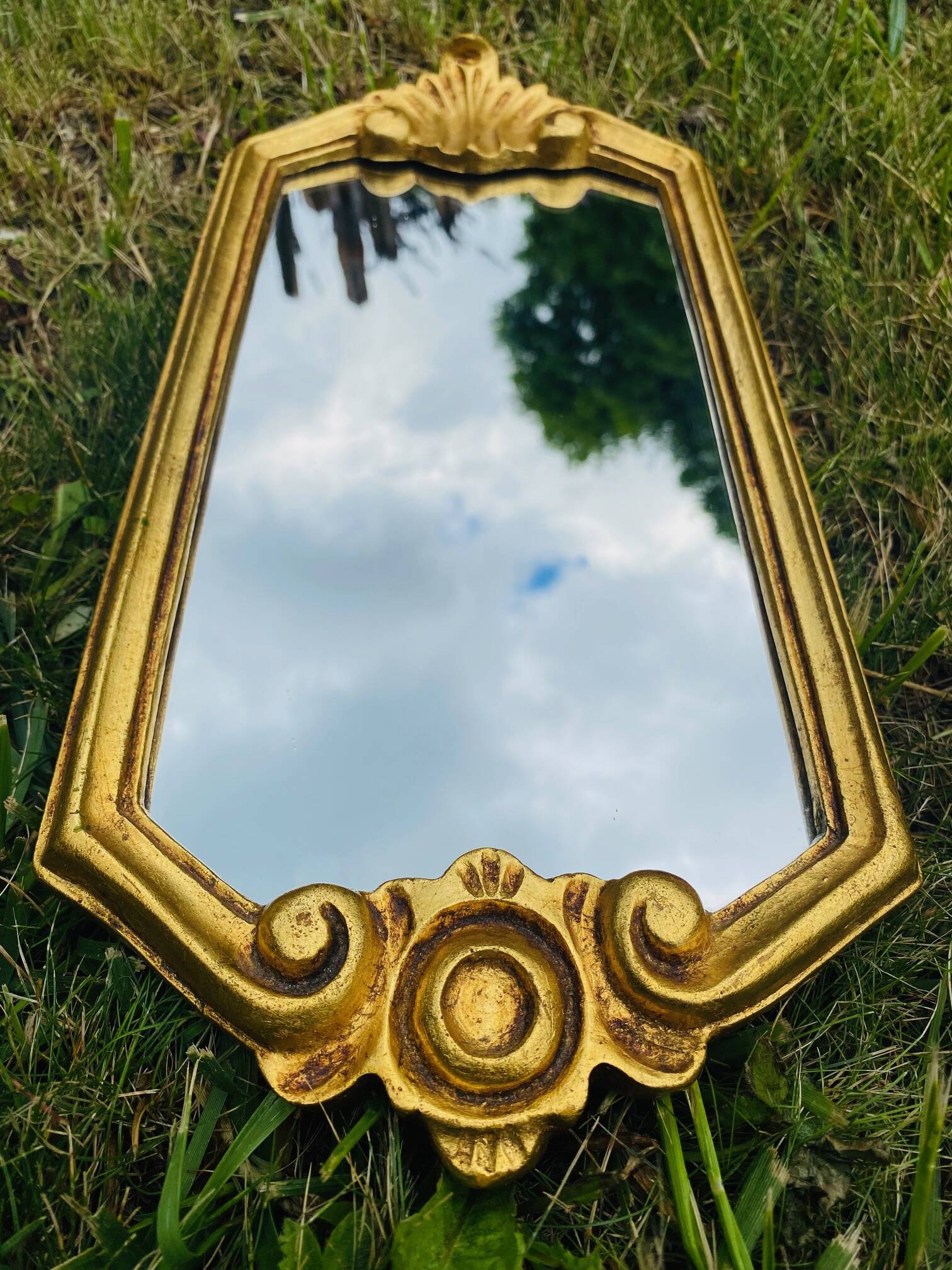 Antique gilded mirror.