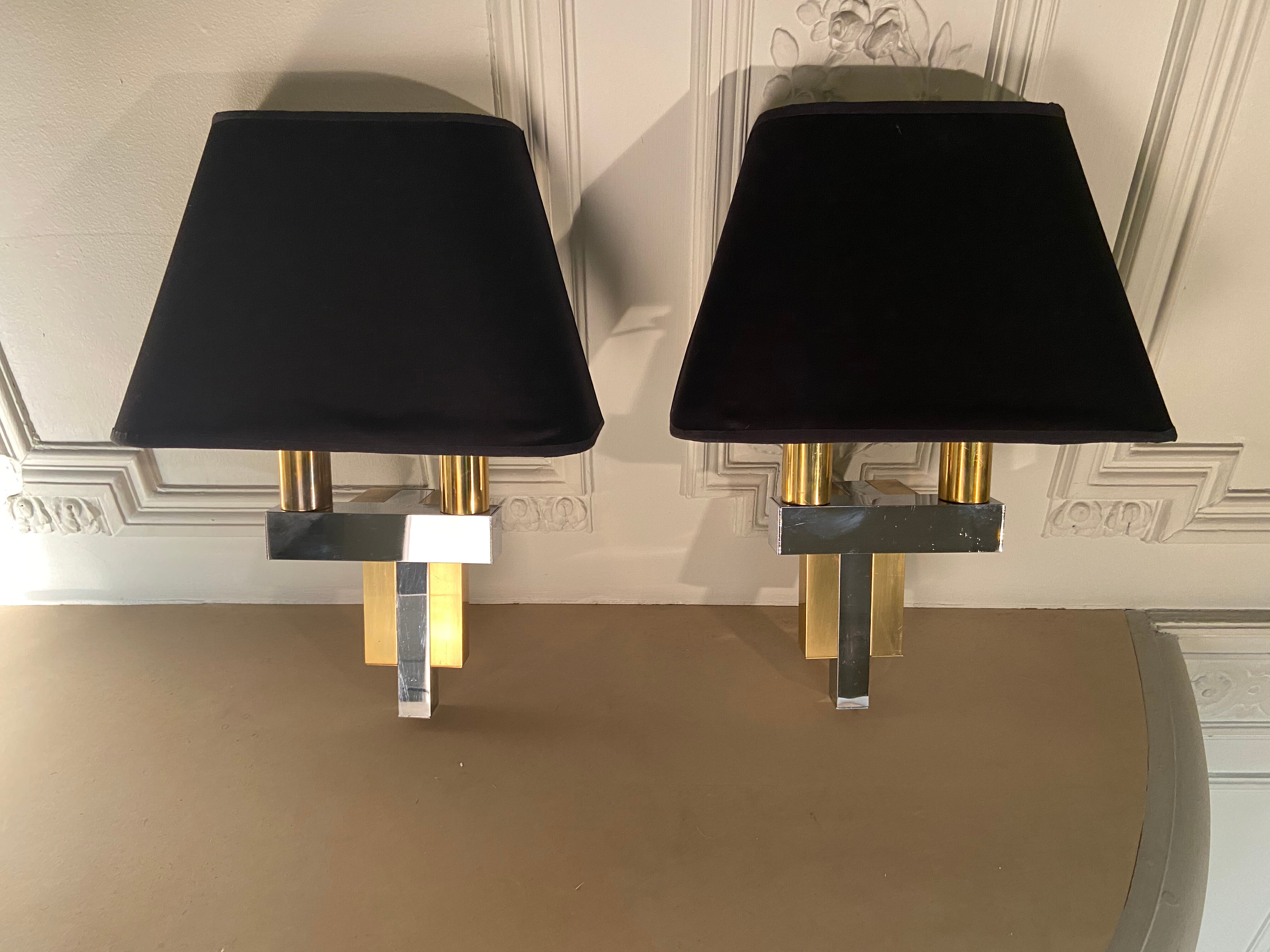 Pair of brass and chrome sconces