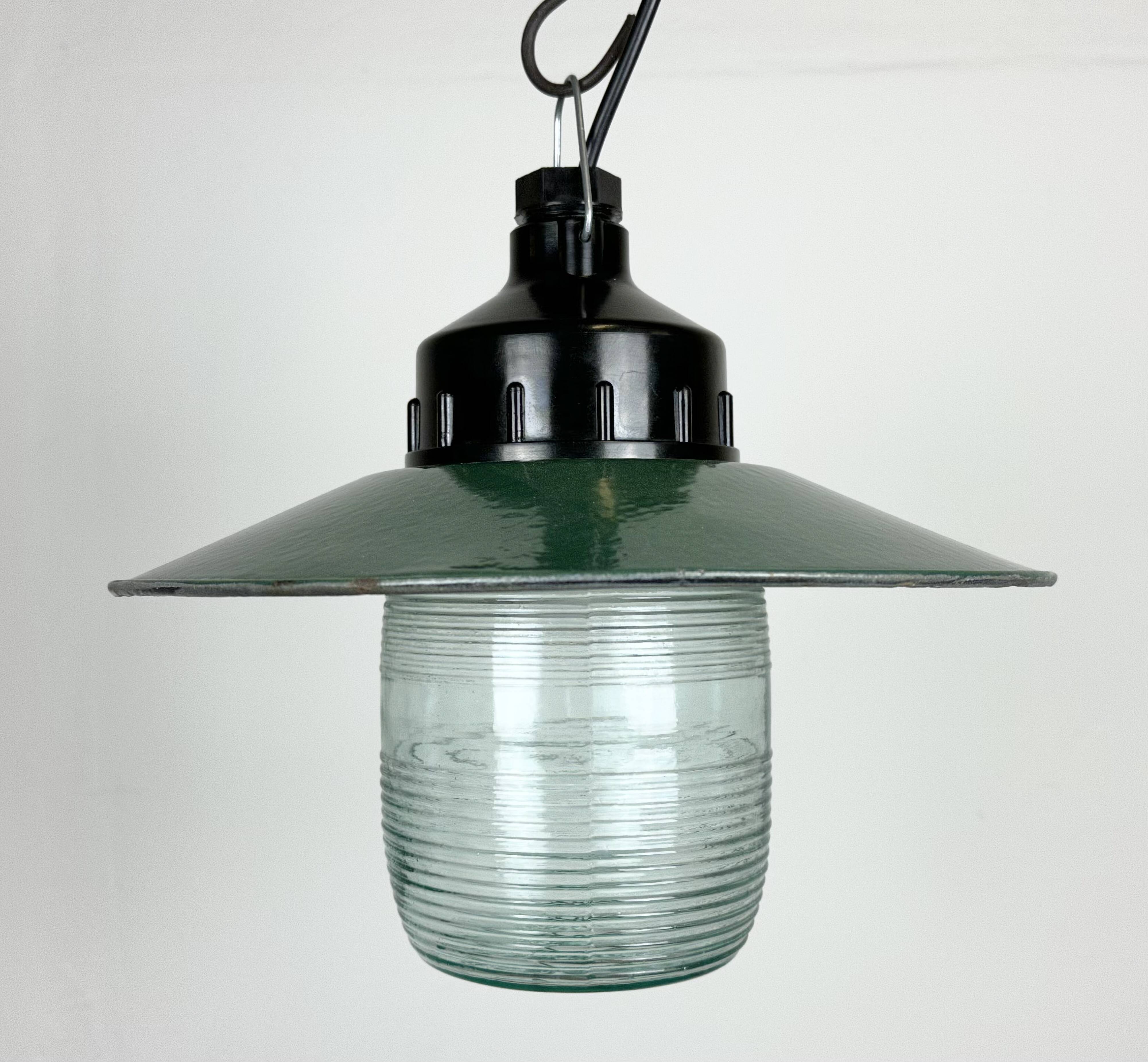 Industrial bakelite green enamel pendant light with ribbed glass, 1970s