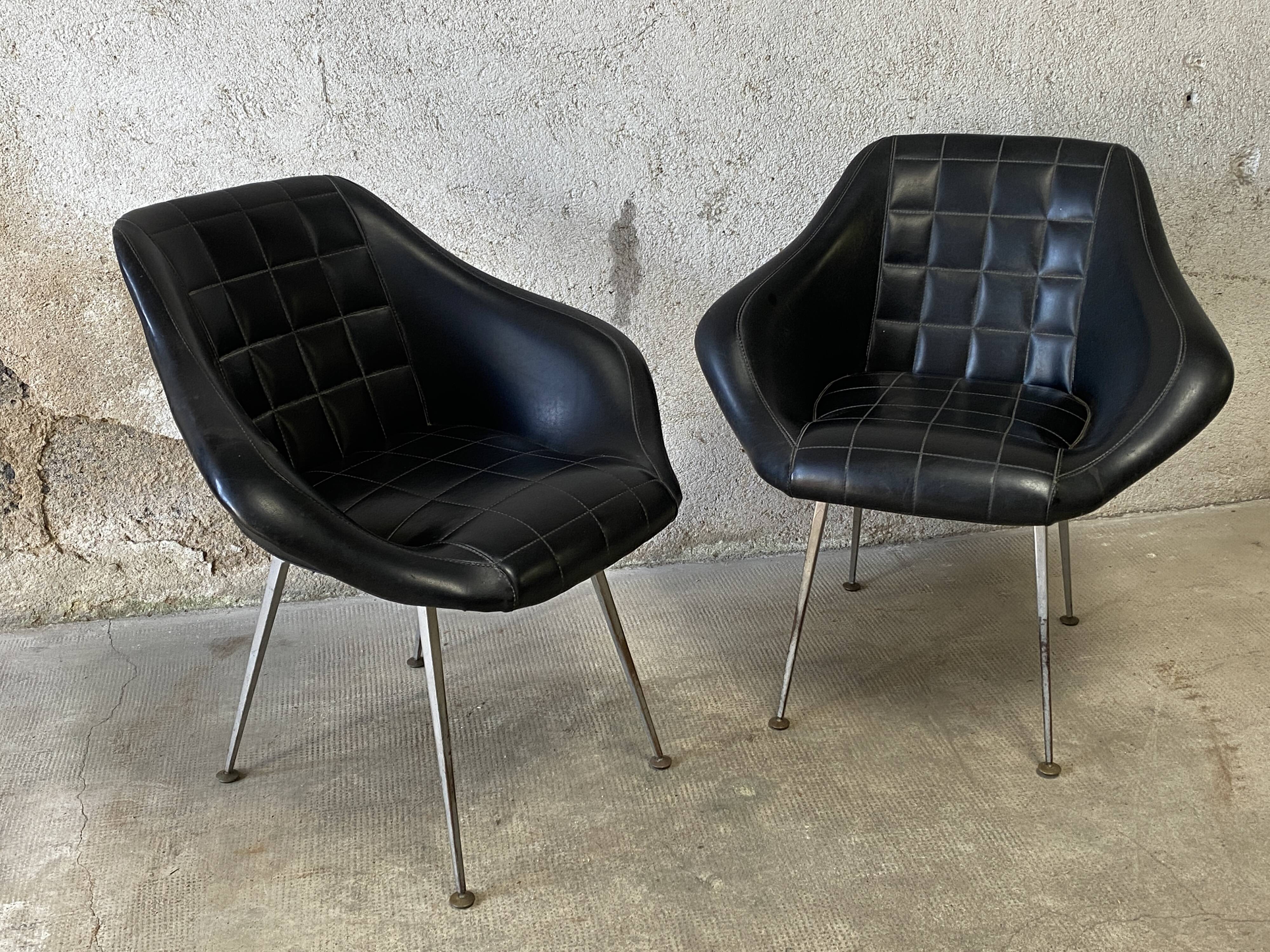 Pair of upholstered armchair year 60
