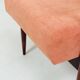 Mid-century modern armchair in coral red designed by H. Lis.