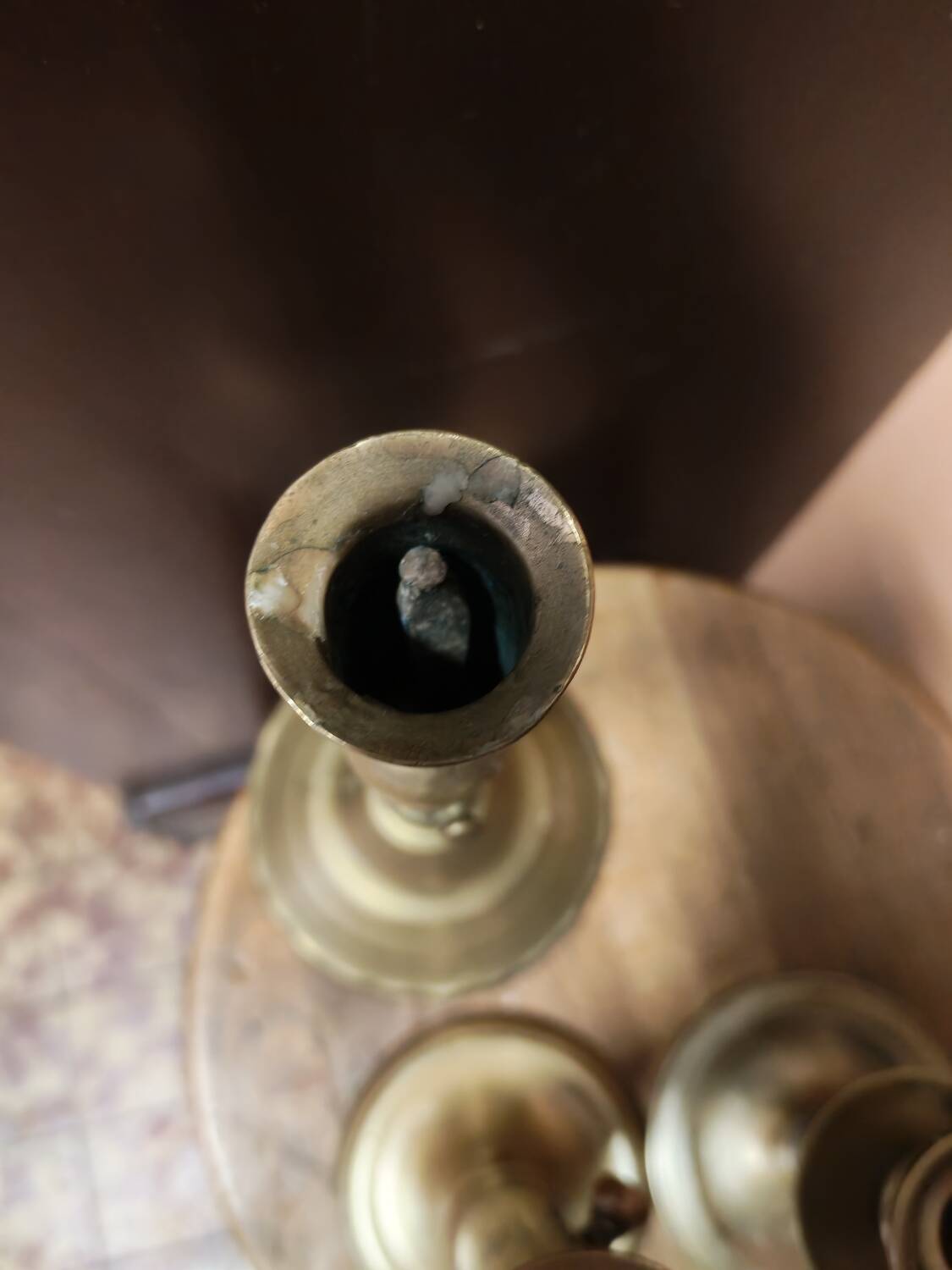Set of three solid brass candle holders