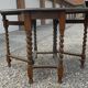 Oval folding table with turned legs