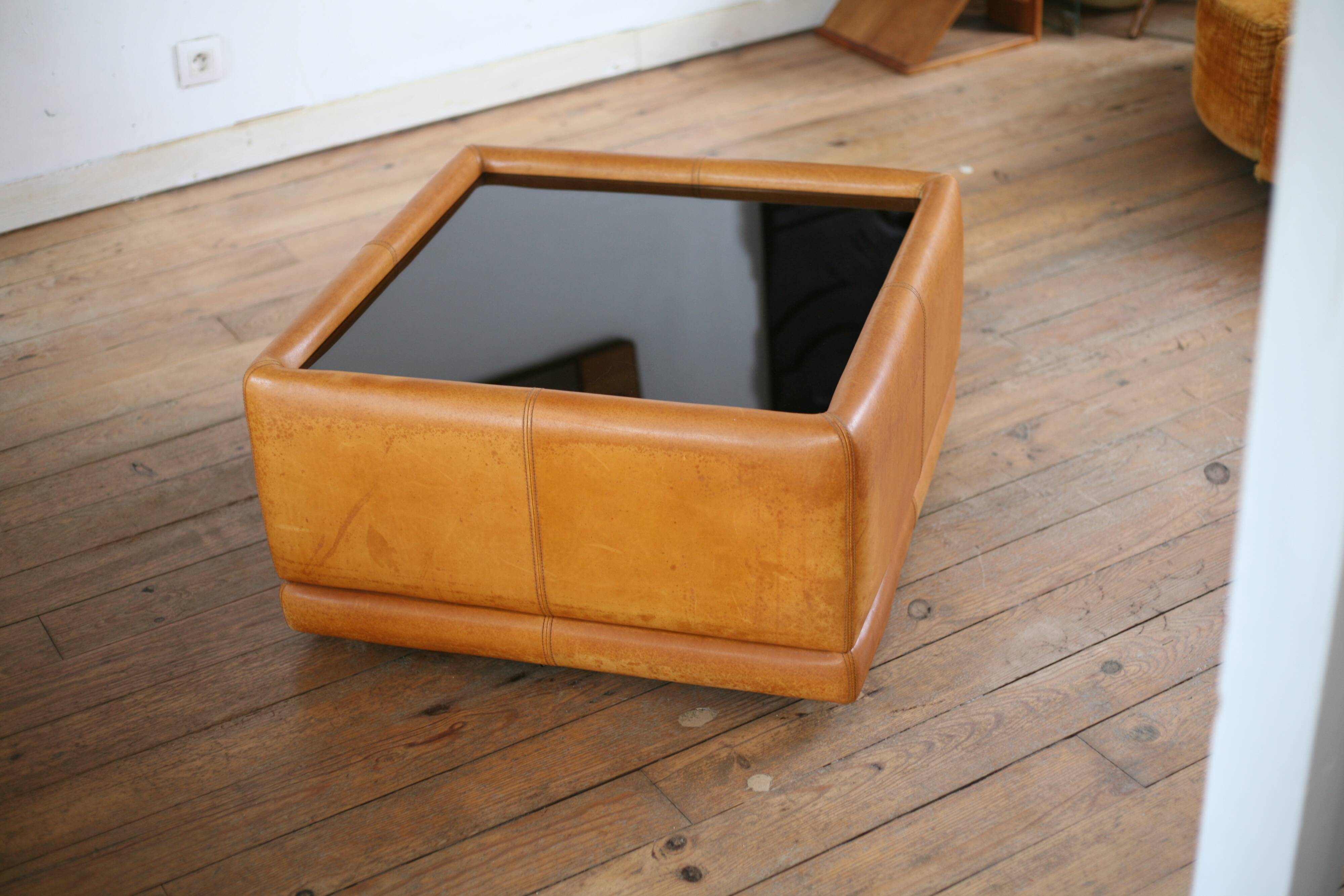 black leather and glass coffee table, vintage design