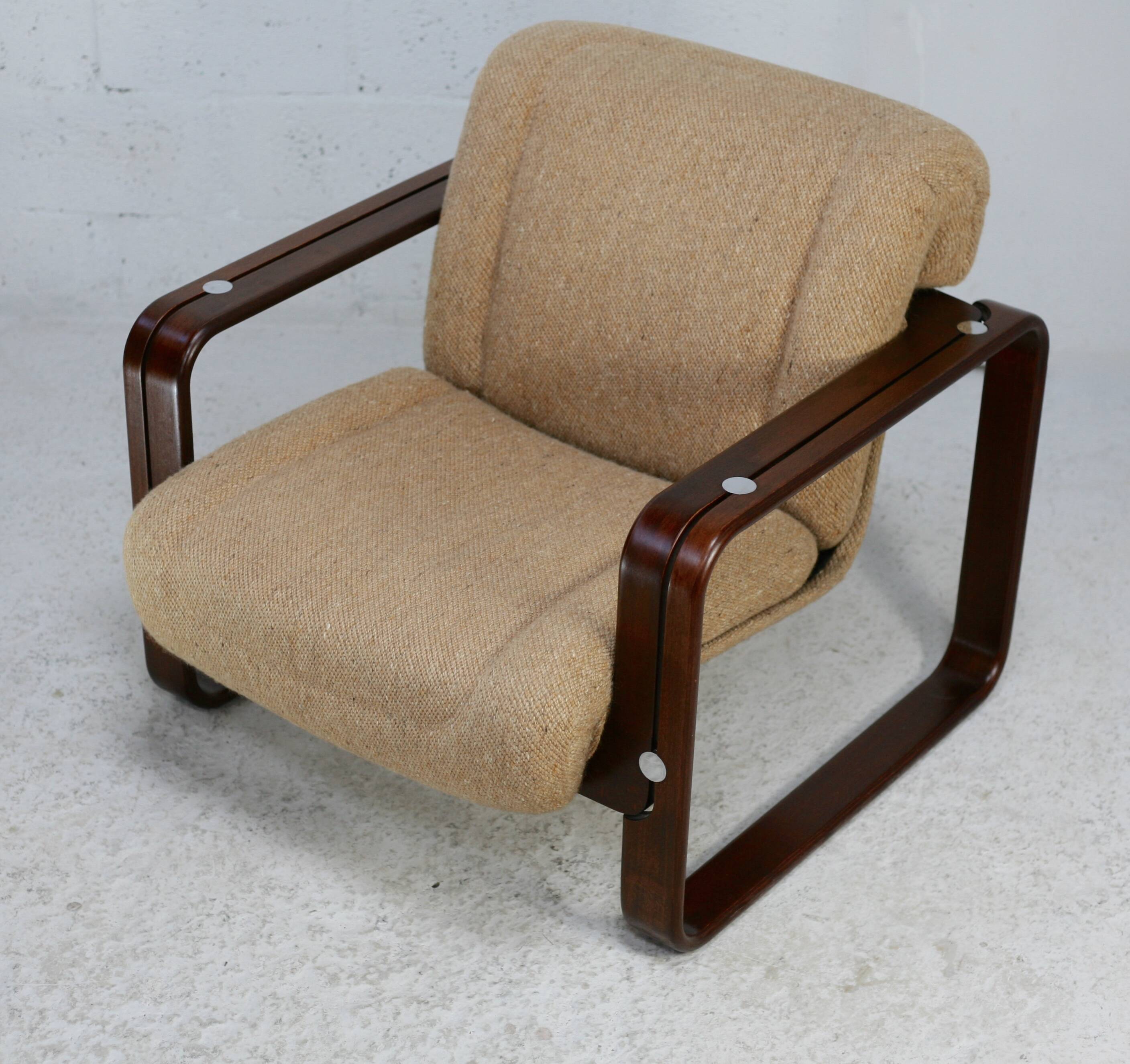 Modernist armchair. Wool, wood and steel. Circa 1970
