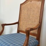 Two Regency-style caned armchairs with upholstered seats