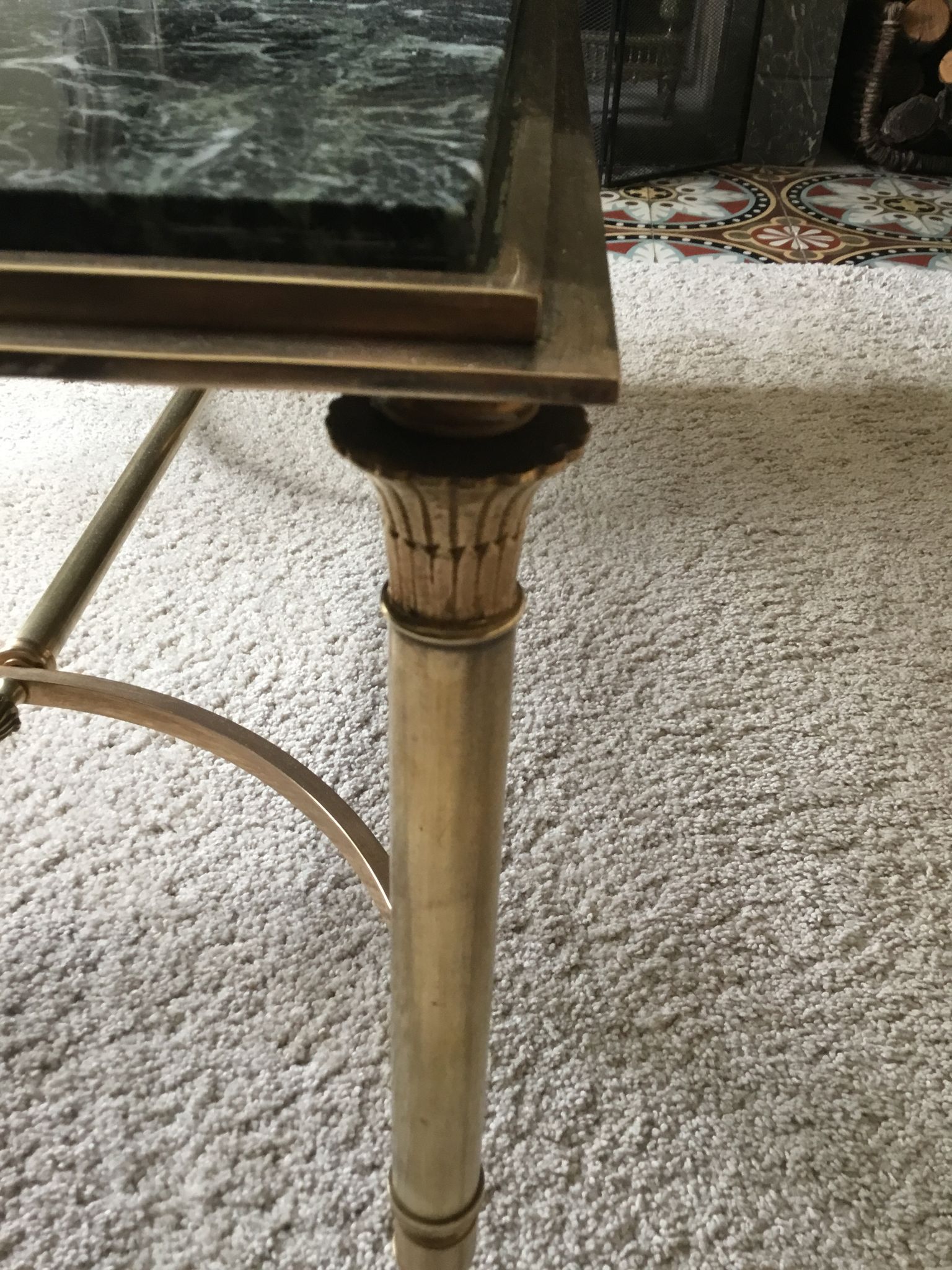 Gold bronze and marble coffee table, tapered feet decorated with Egyptian capitals