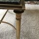 Gold bronze and marble coffee table, tapered feet decorated with Egyptian capitals