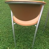 Leather and metal armchairs