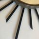 Sun mirror 1960 in patinated brass and black rays 50cm