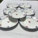 7 assiettes plates Mary Lou Digoin bord bleu