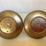 Pair of green and gold wooden candlesticks