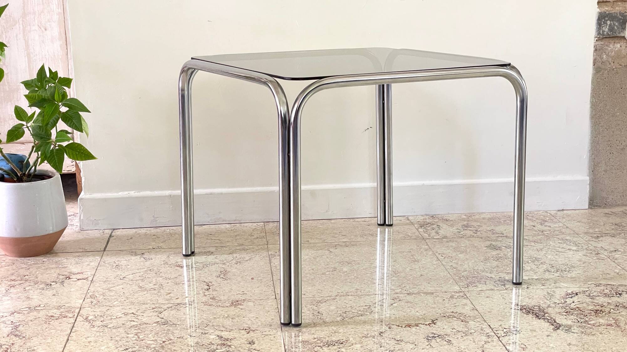 1970s coffee table glass and chrome steel