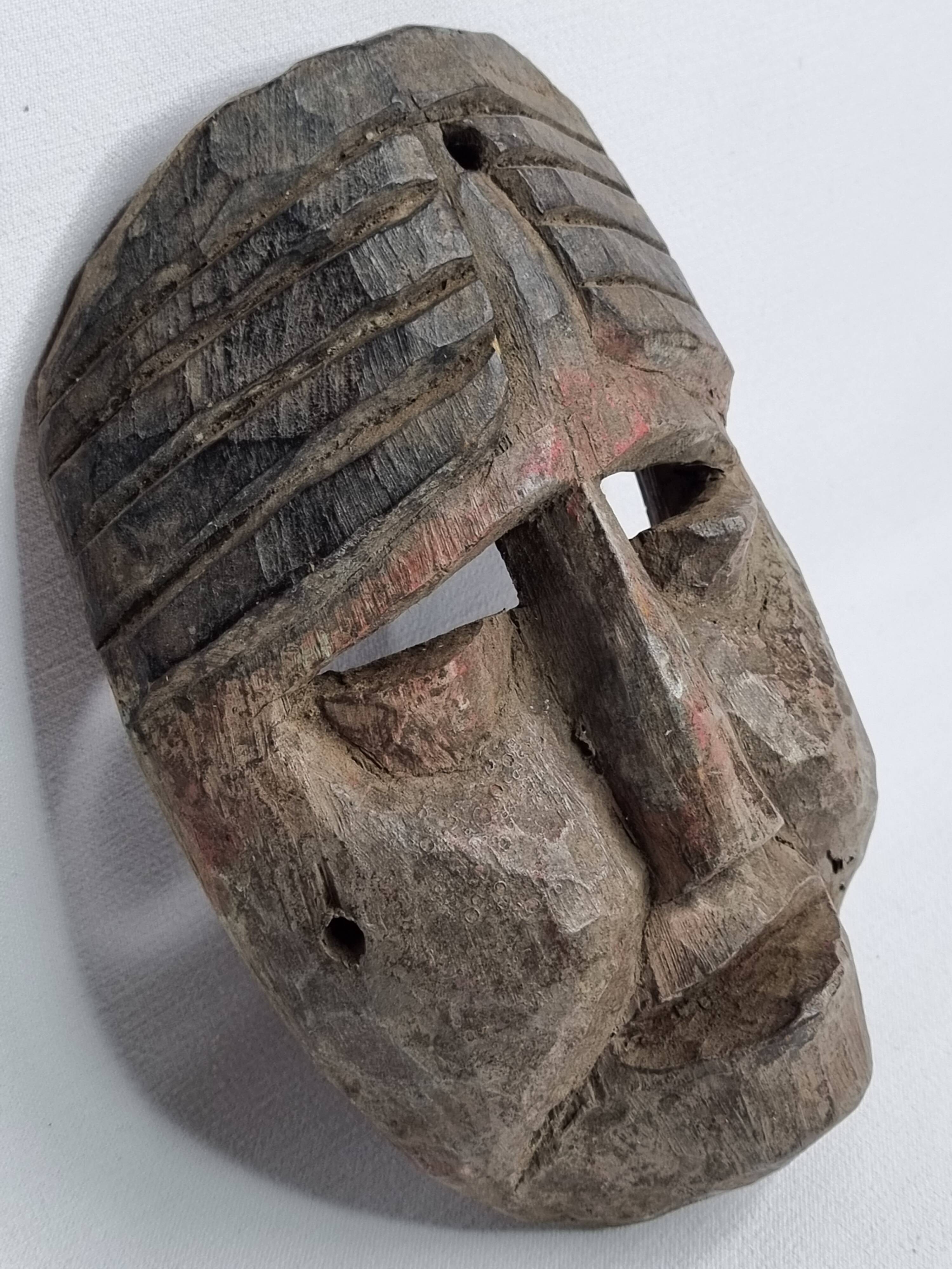 Antique ritual mask in carved wood, Himalayas, 20th century – 19 cm