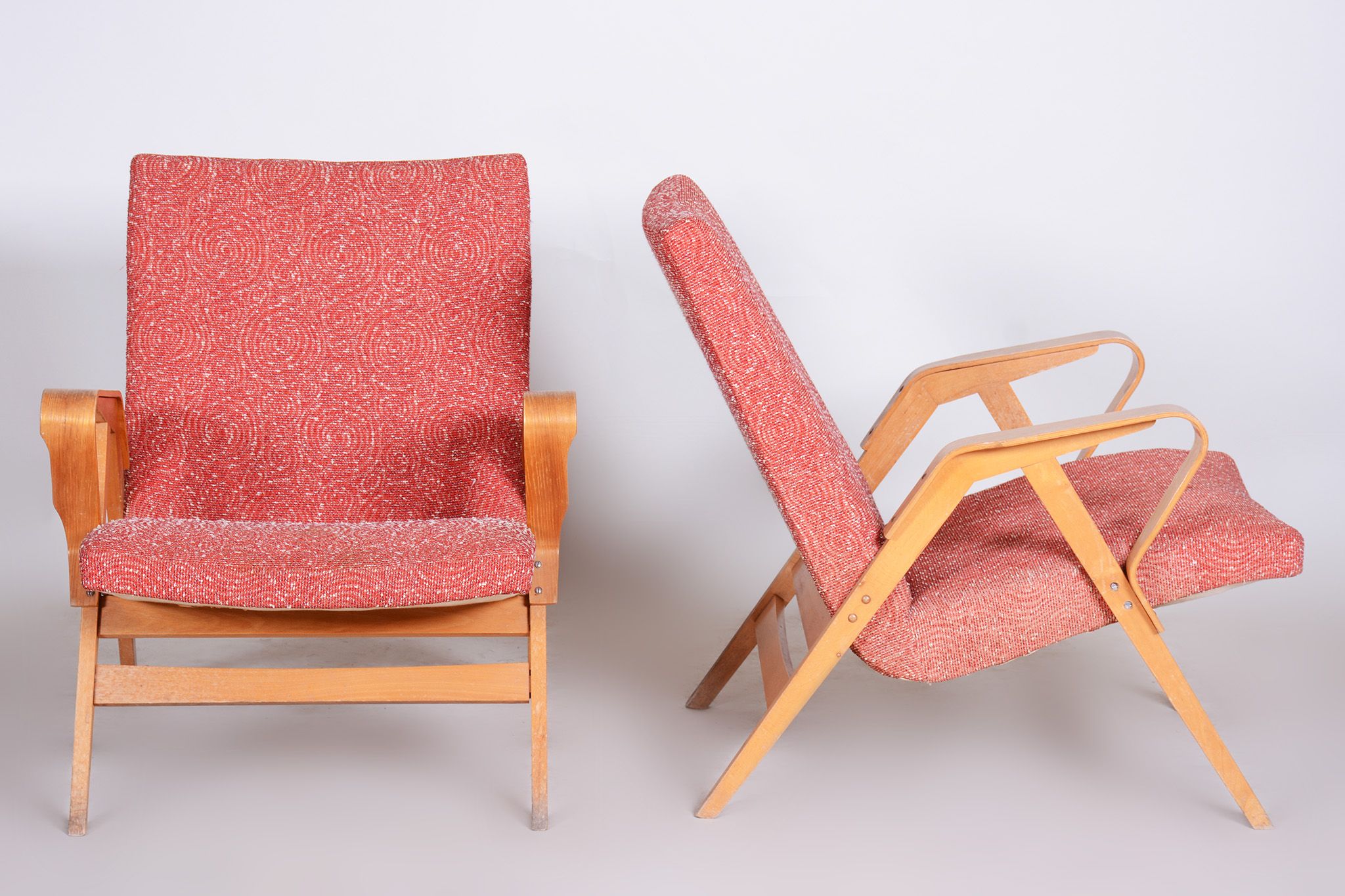 Pair of salmon midcentury armchairs, made by Tatra pravenec, 1950s czechia