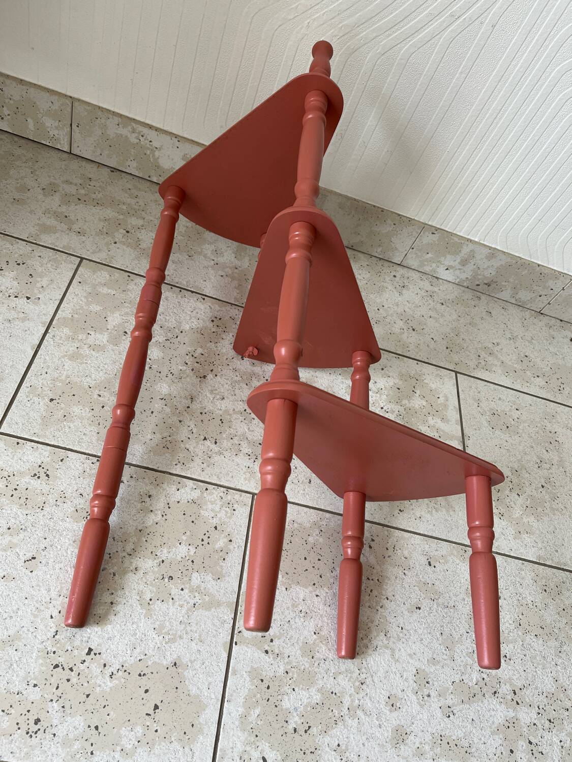 Old plant holder repainted in terracotta