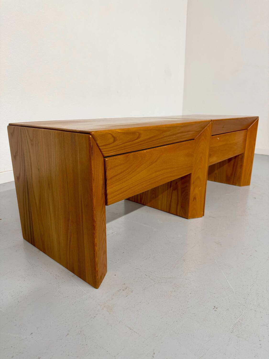 2 bedside tables in elm, designed by Maison Regain, France, 1970s.