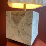Beige marble stucco base, Houles white ecru fringed lampshade.