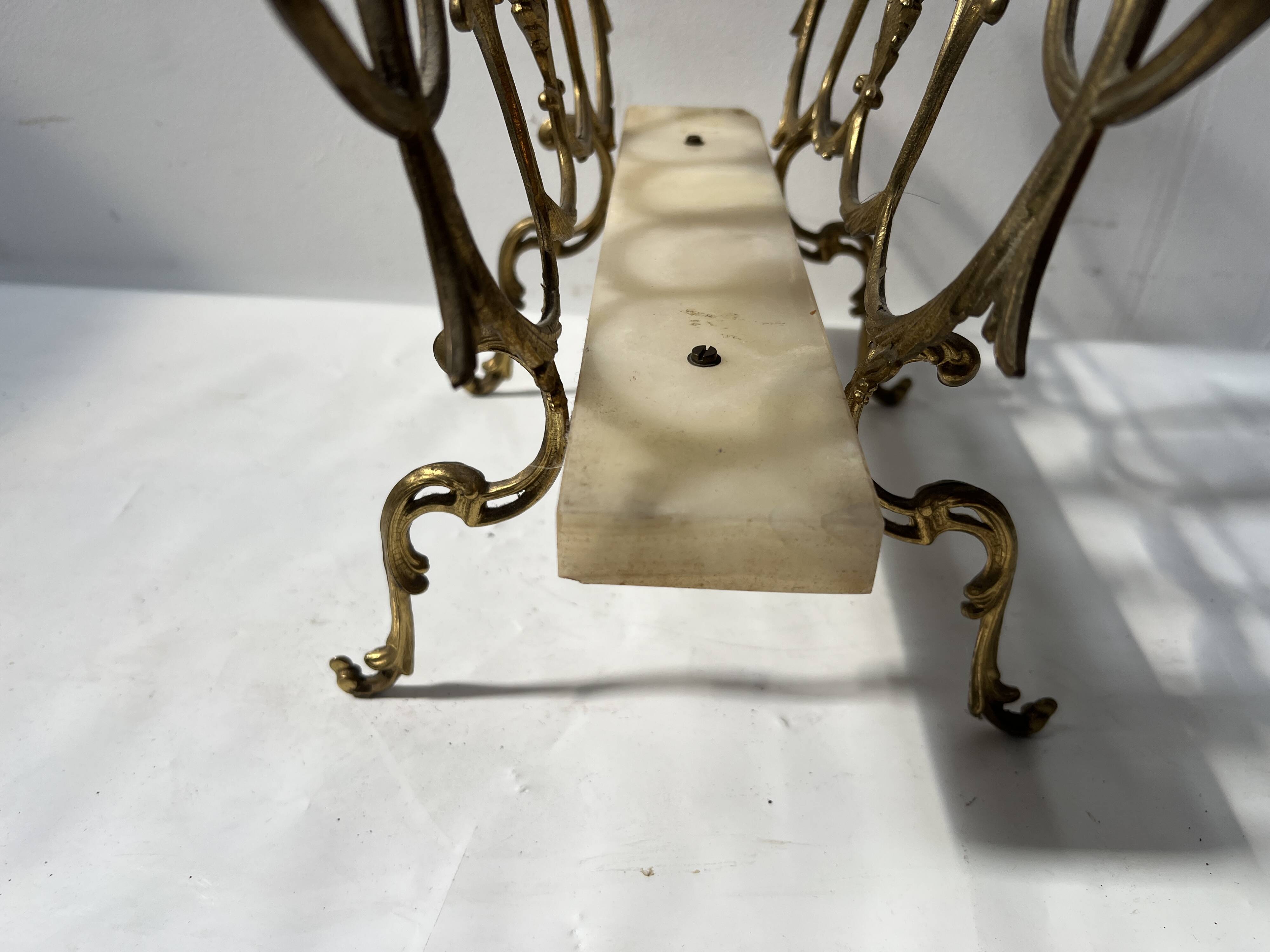 20th century openwork bronze and brass magazine rack