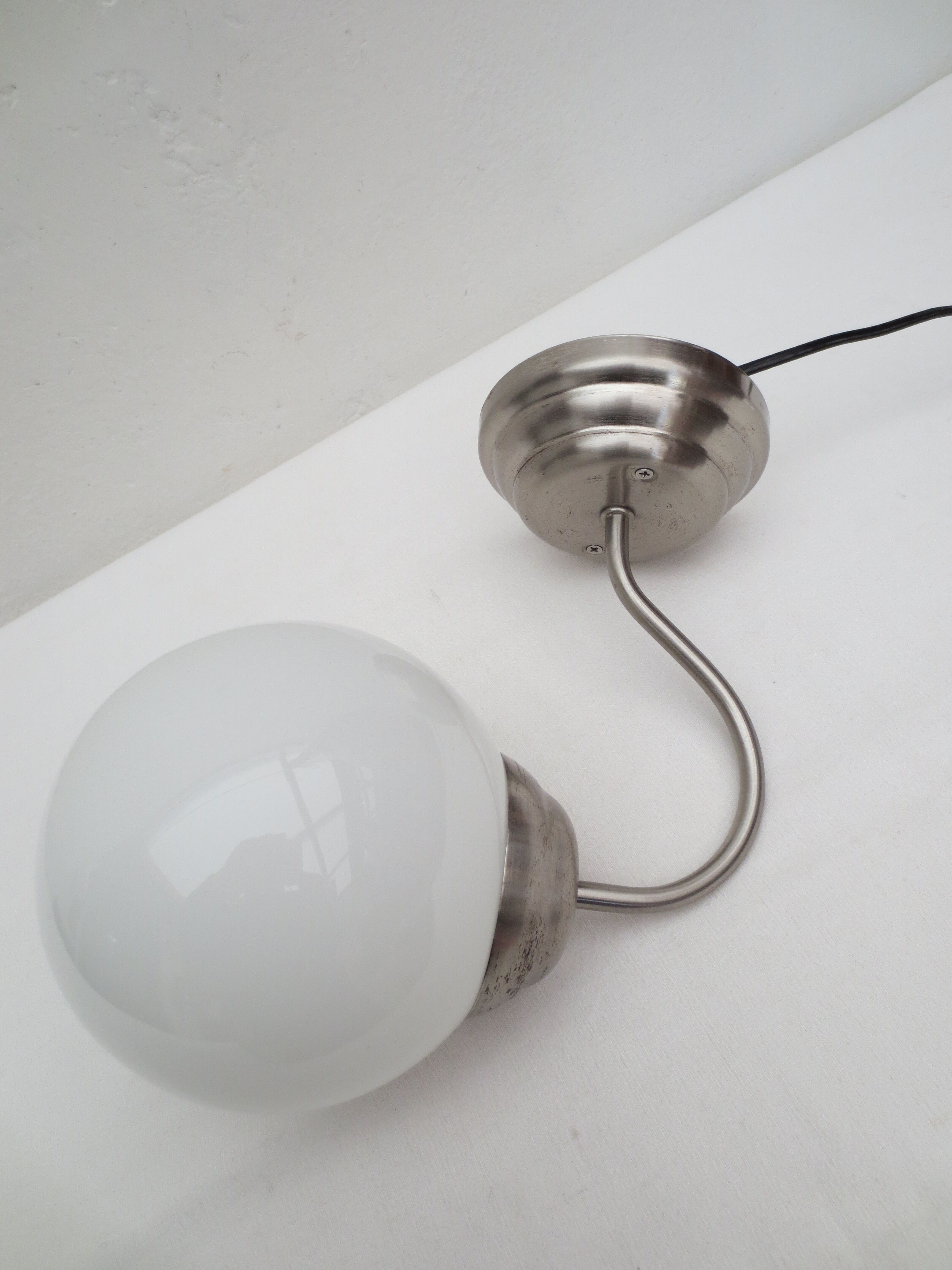 Gooseneck wall lamp, white opaline round globe