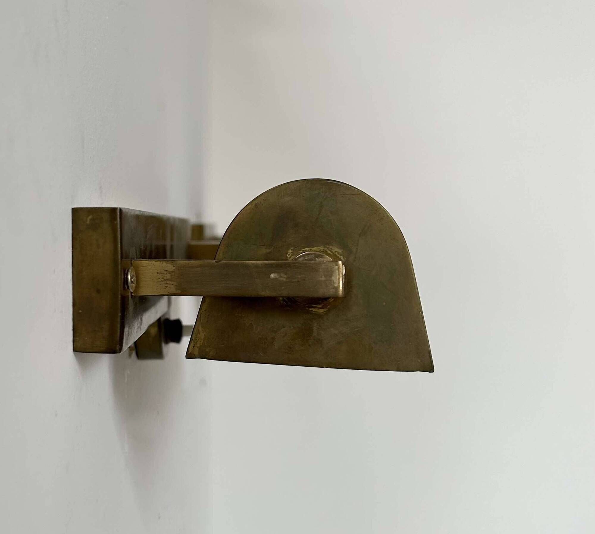 Pair of vintage modernist wall lights, adjustable in brass, France 1940