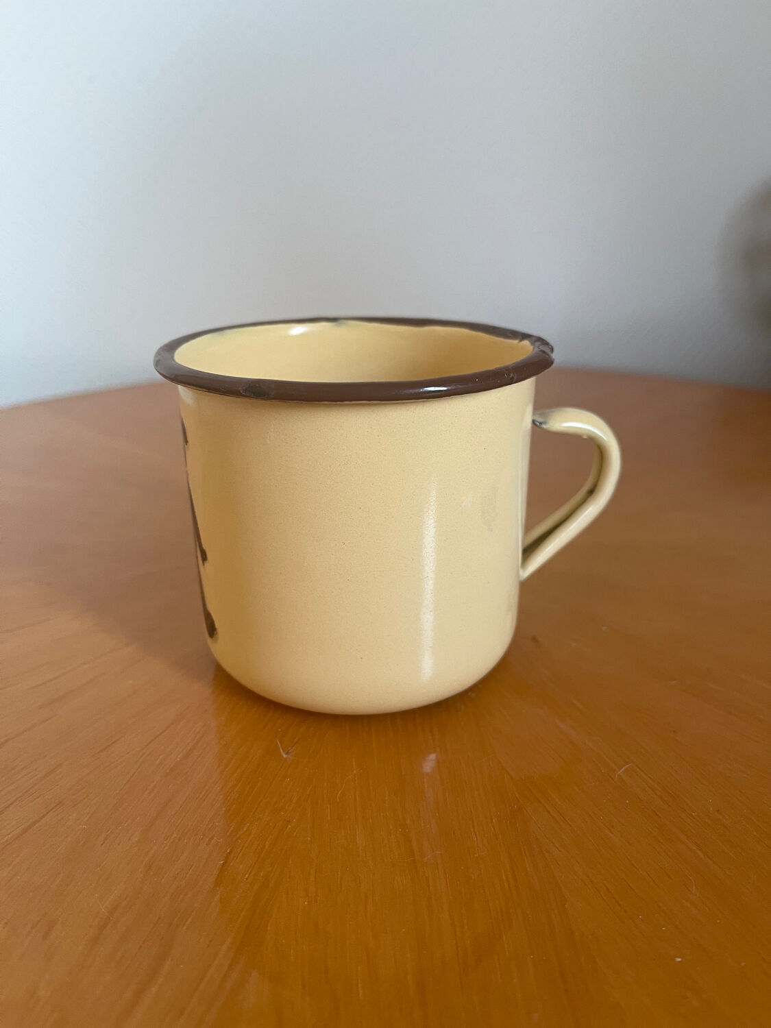 Mug cup in vintage enamelled sheet metal