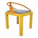 Memphis style chair in the style of Michele De Luchini