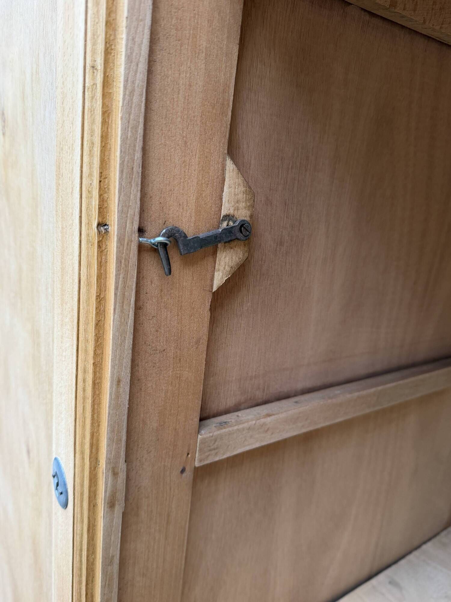 Parisian Art Deco wardrobe, renovated with raw wood.