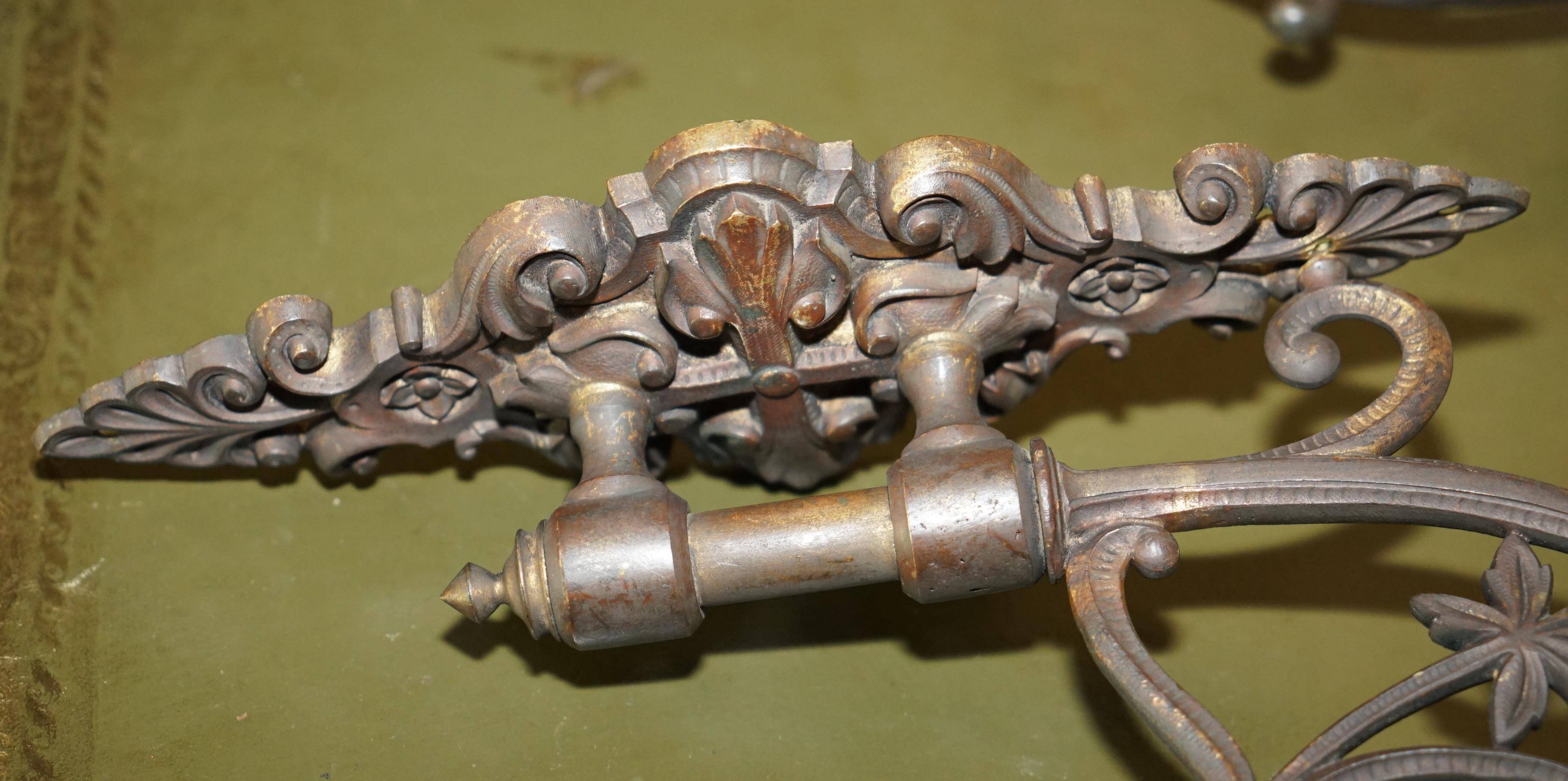 Pair of antique wall sconces in gilded bronze.