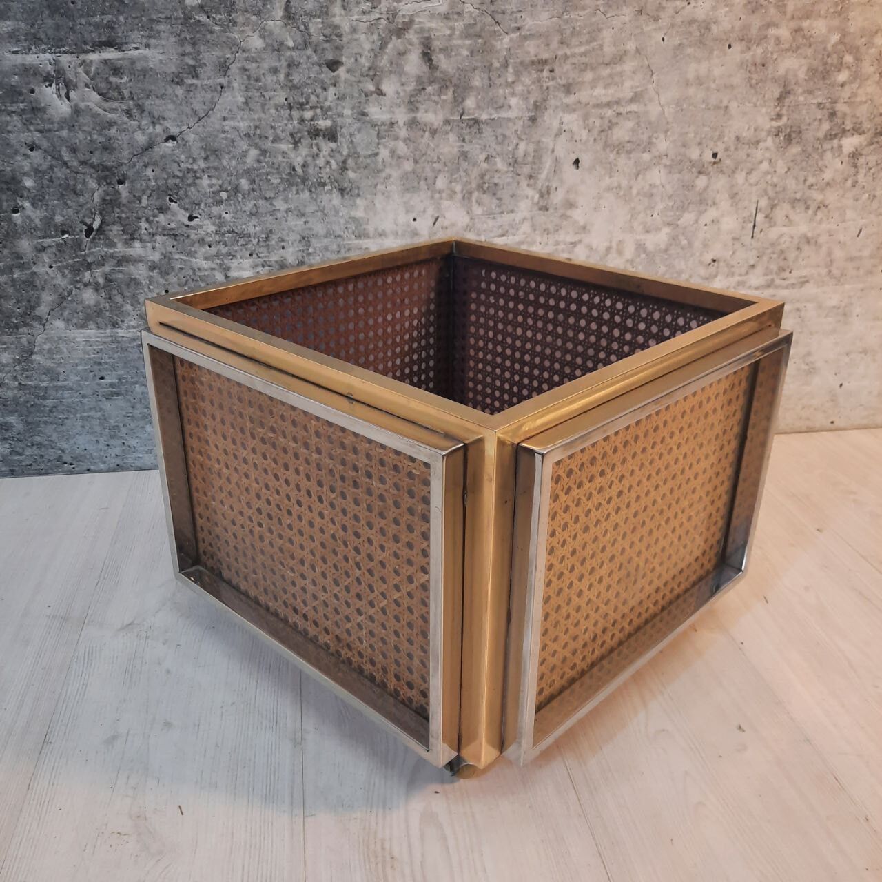 Planter, vintage storage with lightweight wheels, straw, brass and steel, hollywood regency