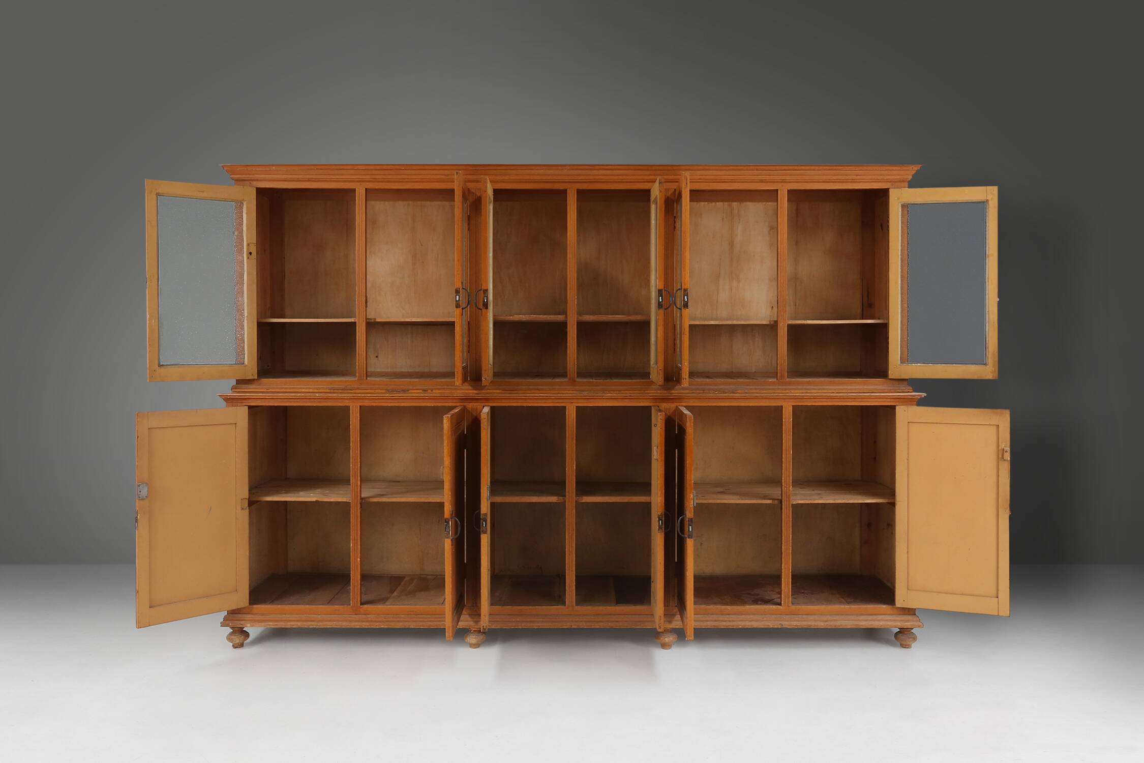 Impressive 12 doors monastery or display cabinet in pine, Belgium, 1890